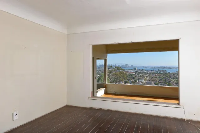 a view of a room that has a window