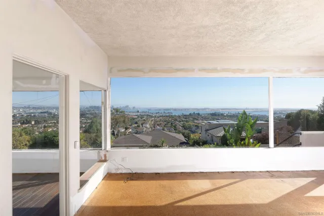 a view of a balcony with city view