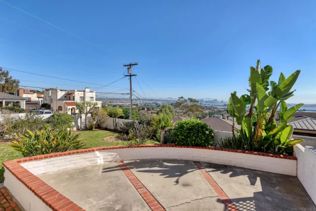 a view of a yard with a street