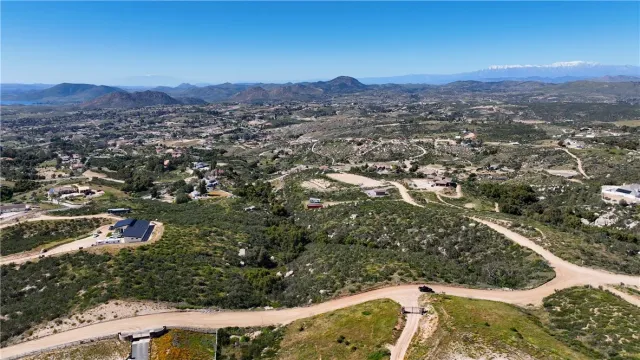 a view of a city with mountains in the background