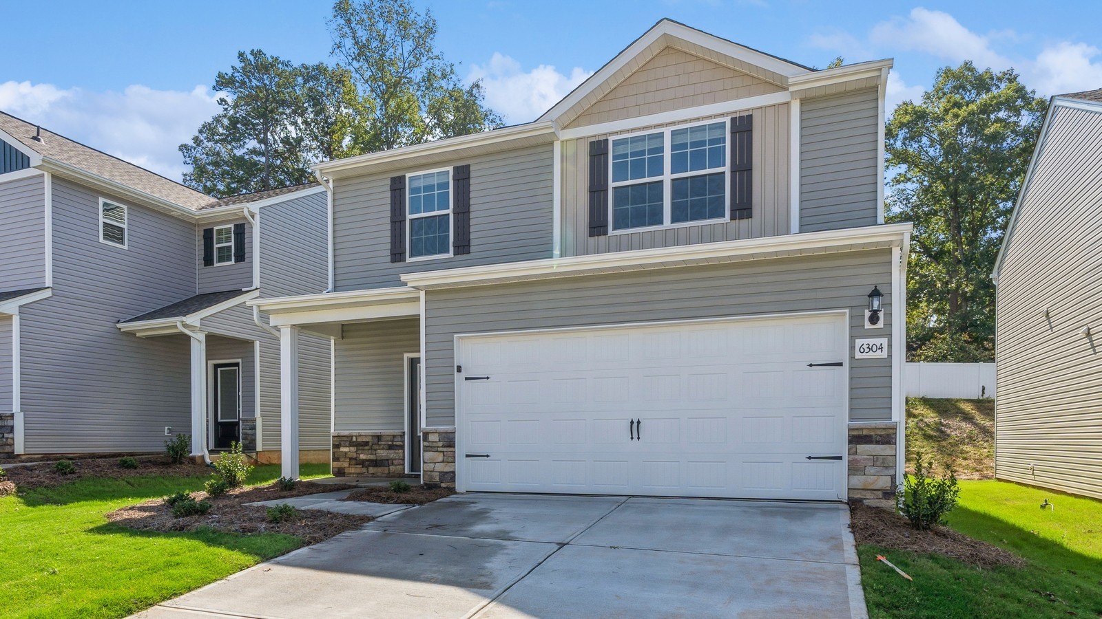 2333 Nabali Way Murfreesboro, TN 37127 - Photo 2 of 38 a front view of a house with garden