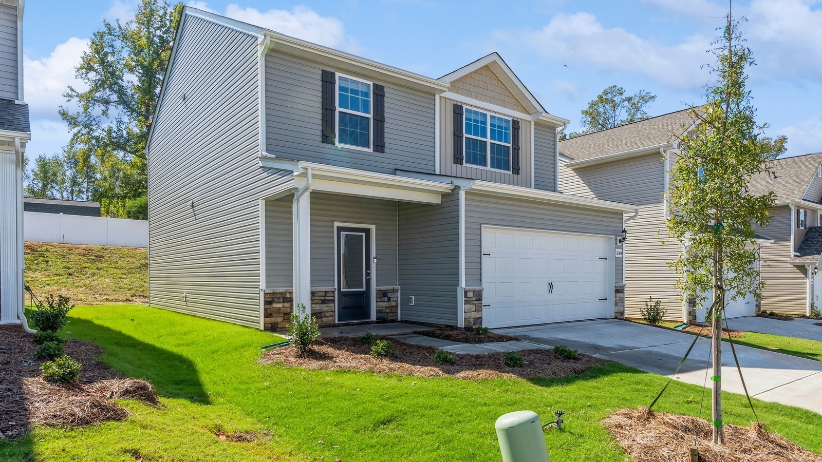 2333 Nabali Way Murfreesboro, TN 37127 - Photo 3 of 38 a front view of a house with a yard and garage