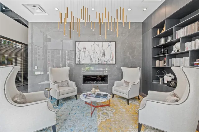 a dining room with furniture and window