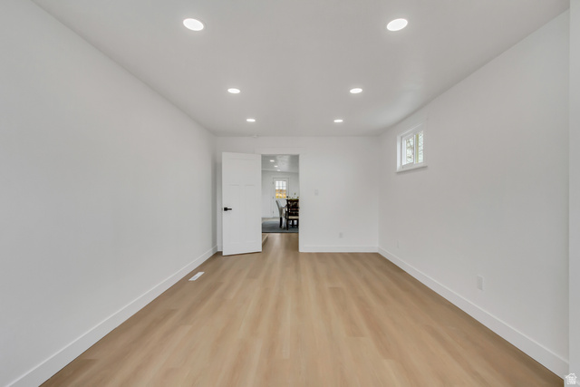 337 West 2900th Street South Bountiful, UT 84010 - Photo 15 of 35 Spare room with light wood-style flooring and recessed lighting