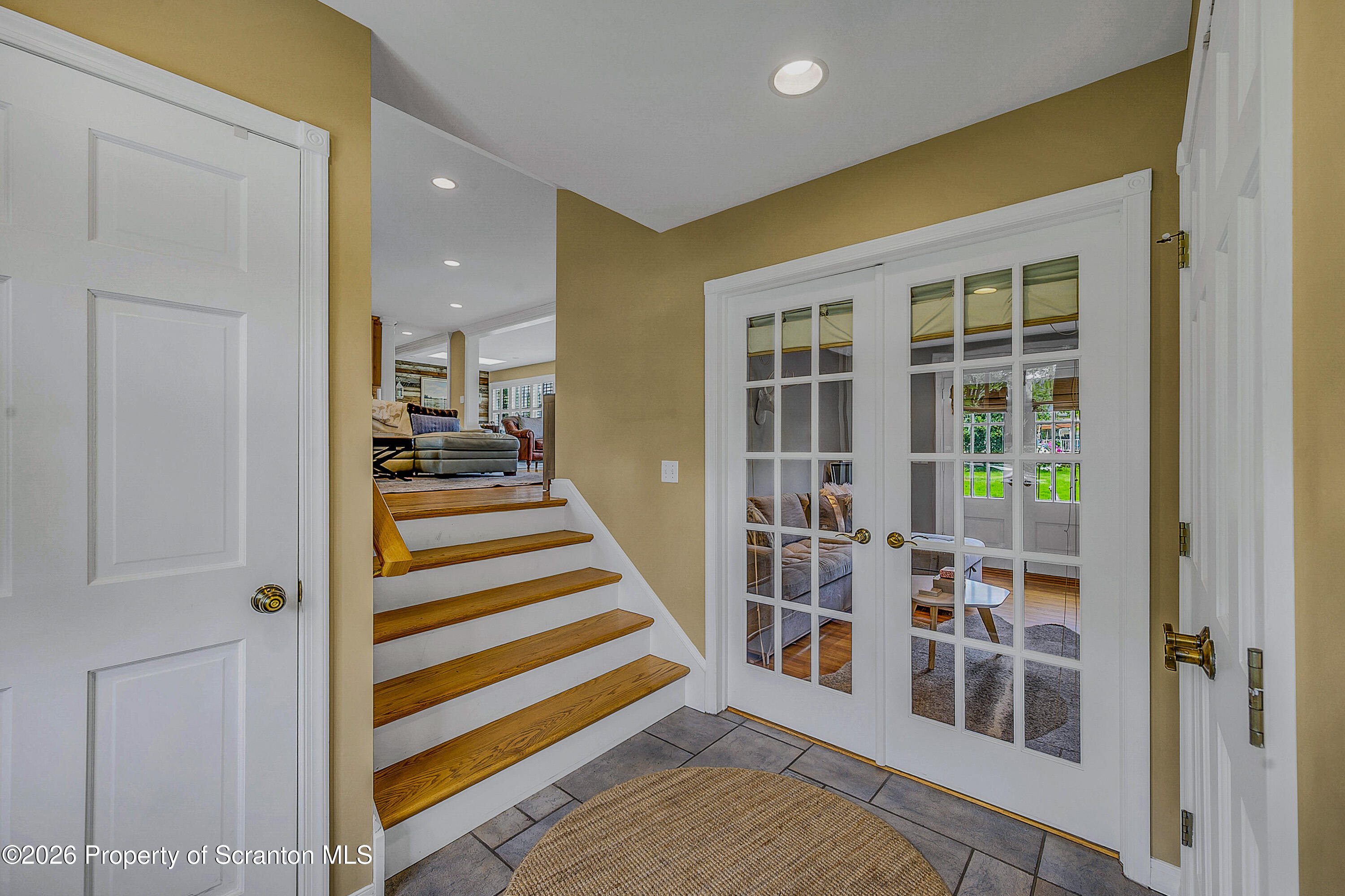 330 Glenburn Road Clarks Green, PA 18411 - Photo 60 of 69 a view of a bedroom with wooden floor and stairs