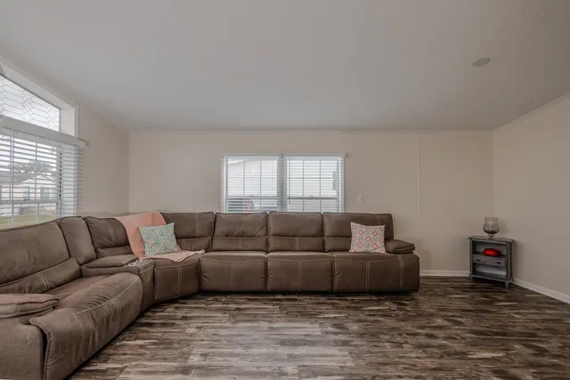 a living room with furniture and a couch