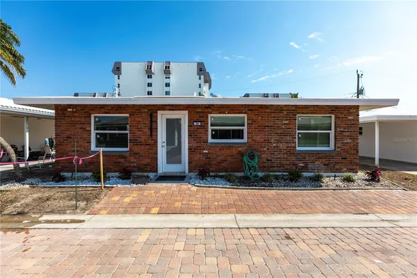 a view of a house with a patio