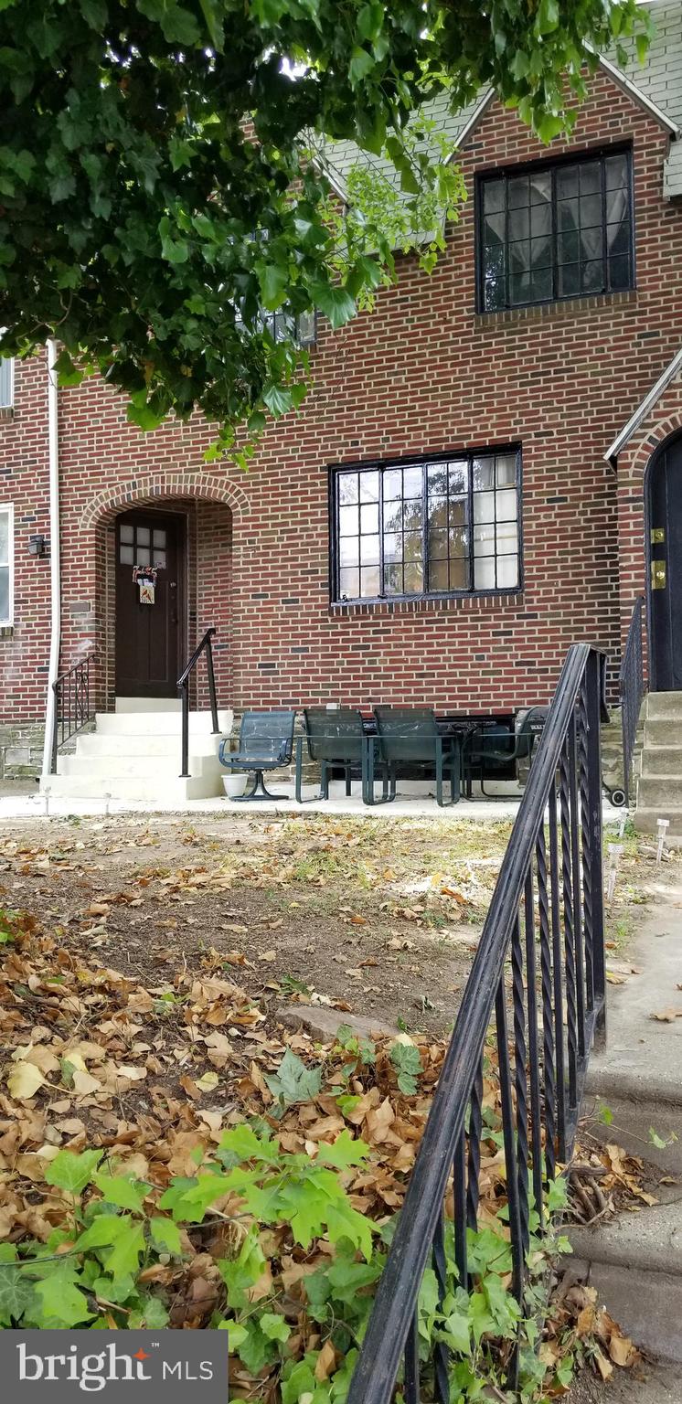 307 Hampden Road Upper Darby, PA 19082 - Photo 1 of 16 a view of a house with backyard and trees