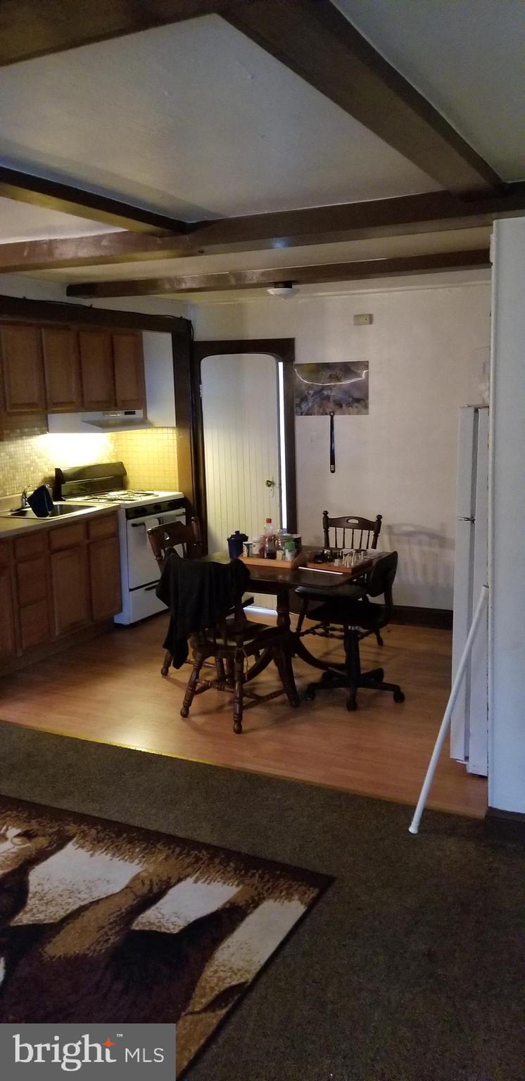 307 Hampden Road Upper Darby, PA 19082 - Photo 7 of 16 a room with furniture pool table and window