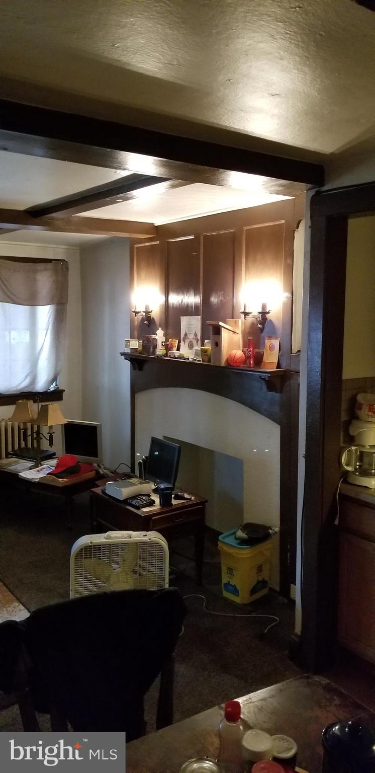 307 Hampden Road Upper Darby, PA 19082 - Photo 10 of 16 a room with furniture and gym equipment