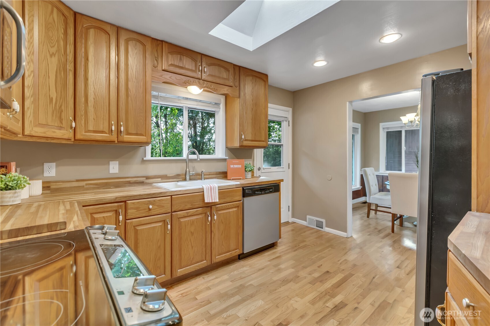 13733 Southeast 272nd Street Kent, WA 98042 - Photo 13 of 40 a kitchen with a sink cabinets and window