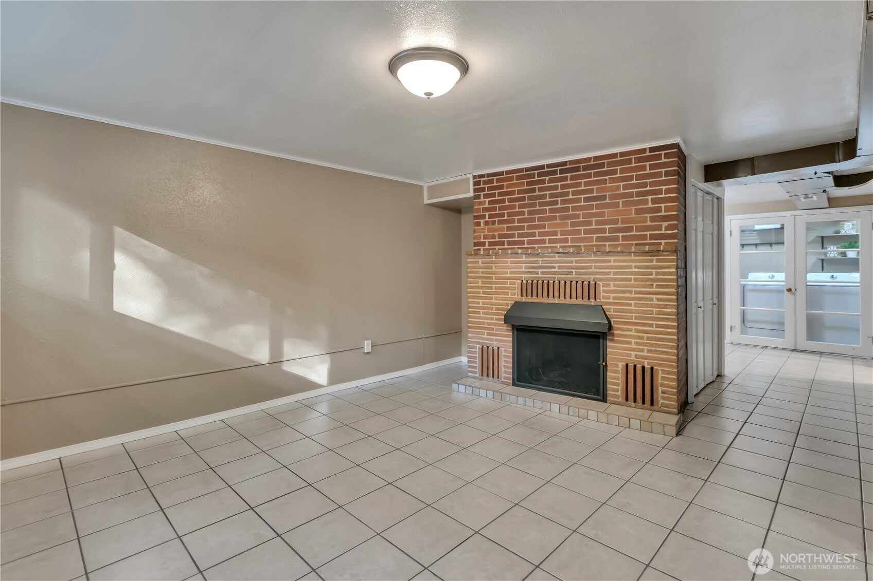 13733 Southeast 272nd Street Kent, WA 98042 - Photo 19 of 40 a view of a livingroom with a fireplace