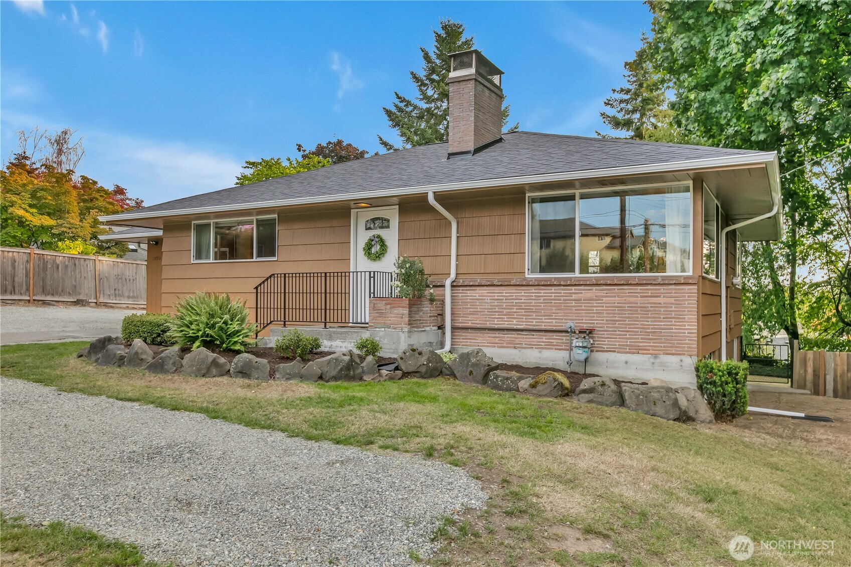 13733 Southeast 272nd Street Kent, WA 98042 - Photo 2 of 40 a front view of a house with garden