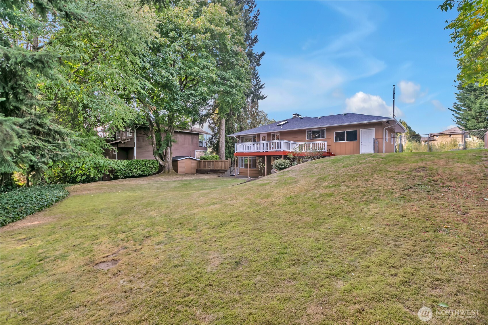 13733 Southeast 272nd Street Kent, WA 98042 - Photo 32 of 40 a view of a house with a yard