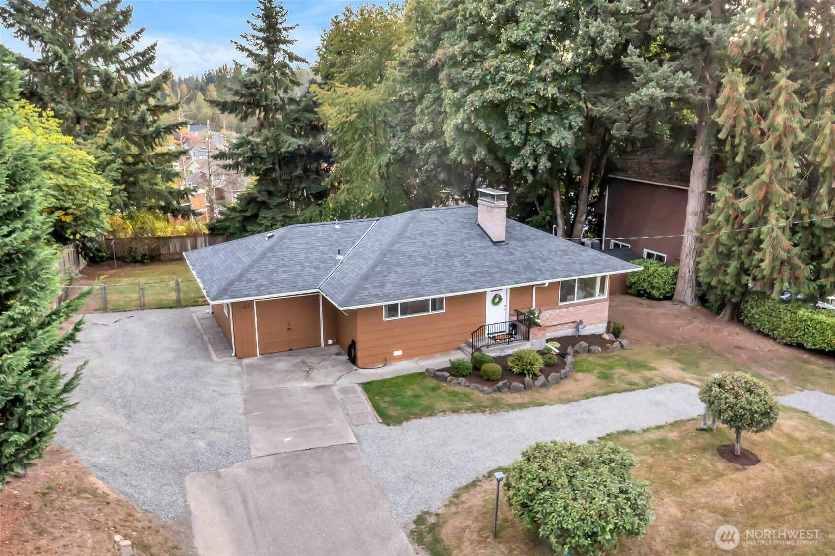 13733 Southeast 272nd Street Kent, WA 98042 - Photo 35 of 40 a view of a house with a yard