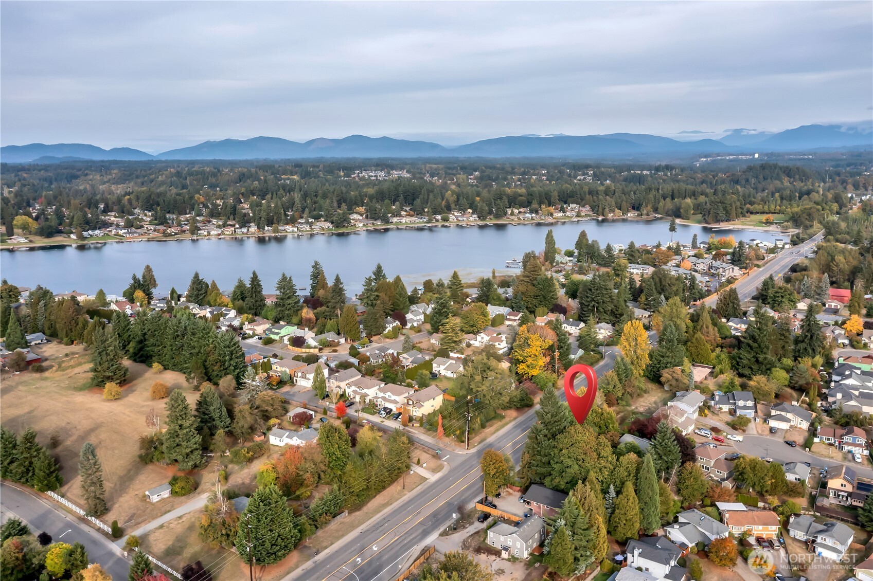 13733 Southeast 272nd Street Kent, WA 98042 - Photo 40 of 40 an aerial view of a city with lots of residential buildings and mountain view in back