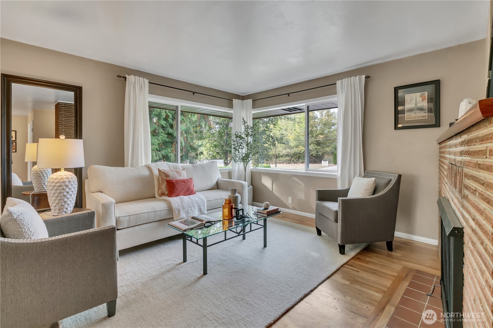 13733 Southeast 272nd Street Kent, WA 98042 - Photo 5 of 40 a living room with furniture and a large window