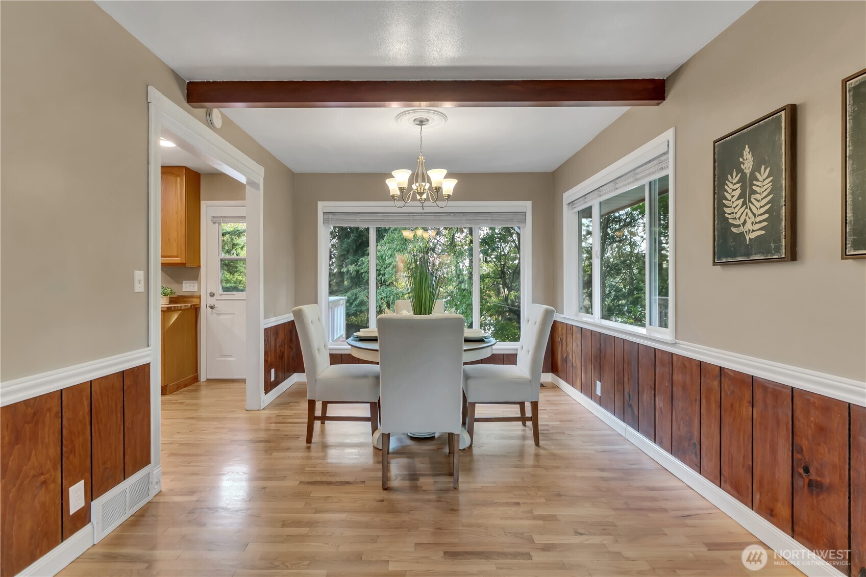 13733 Southeast 272nd Street Kent, WA 98042 - Photo 8 of 40 a dining room with wooden floor a chandelier