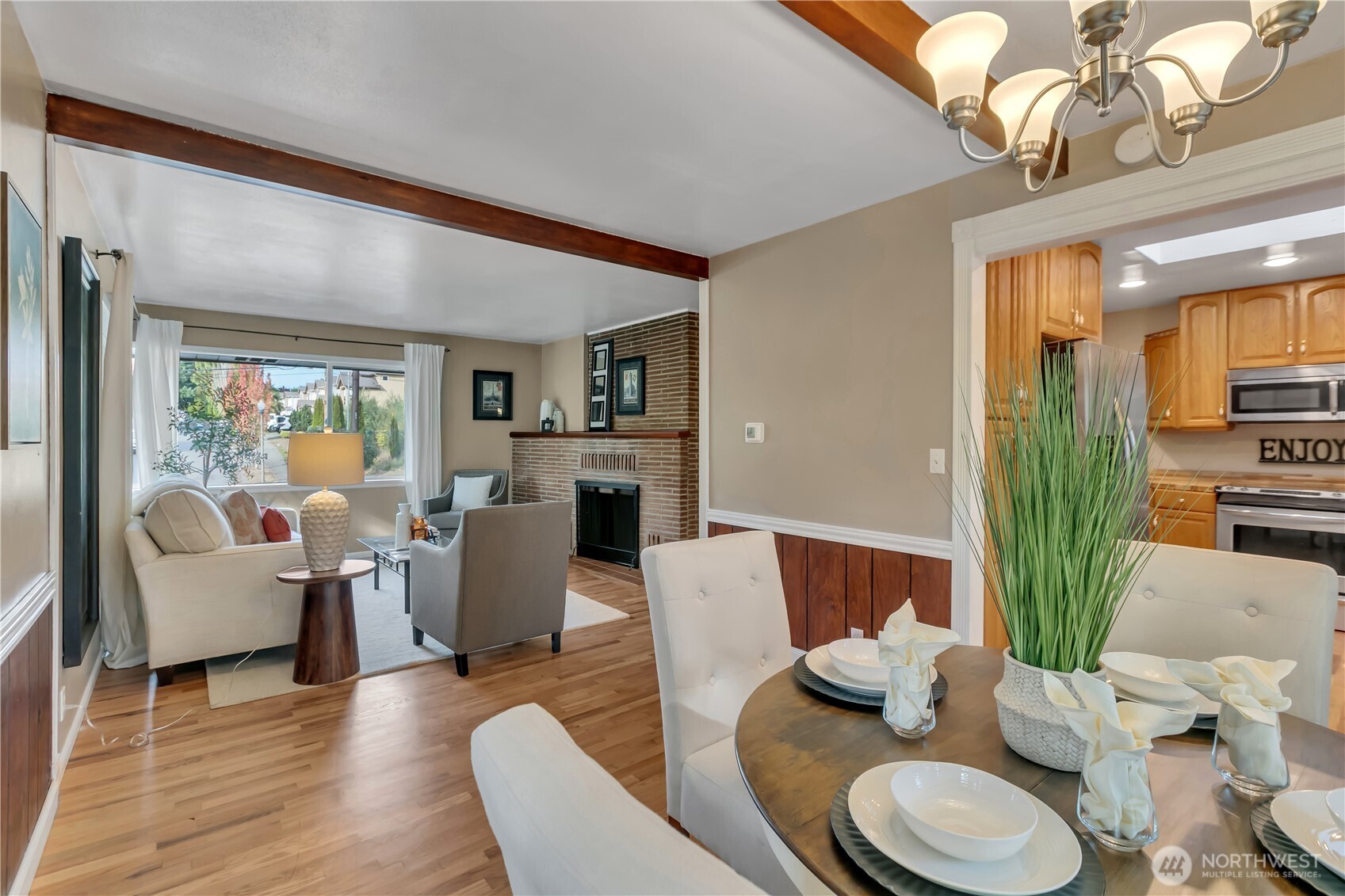 13733 Southeast 272nd Street Kent, WA 98042 - Photo 9 of 40 a living room with furniture and a wooden floor