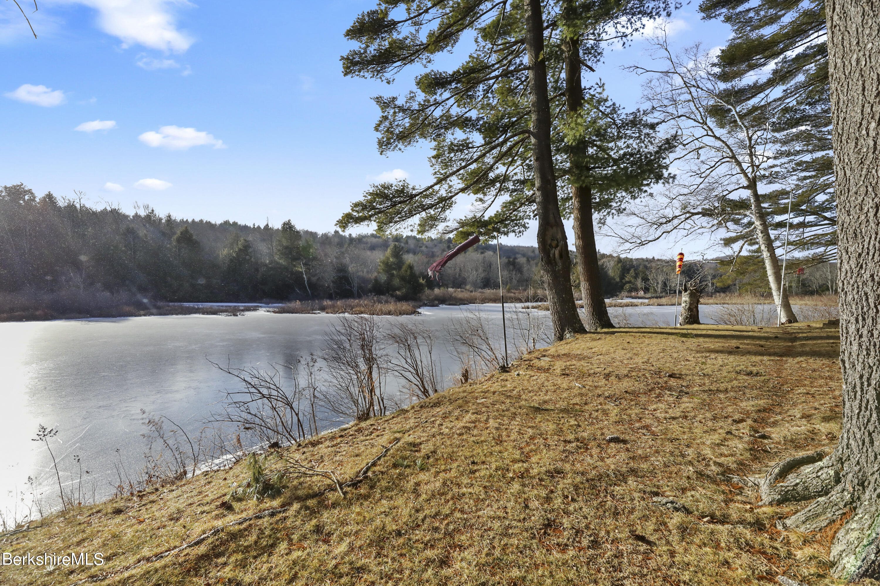 1831 North Main Road Otis, MA 01253 - Photo 14 of 69 a view of a backyard of the house