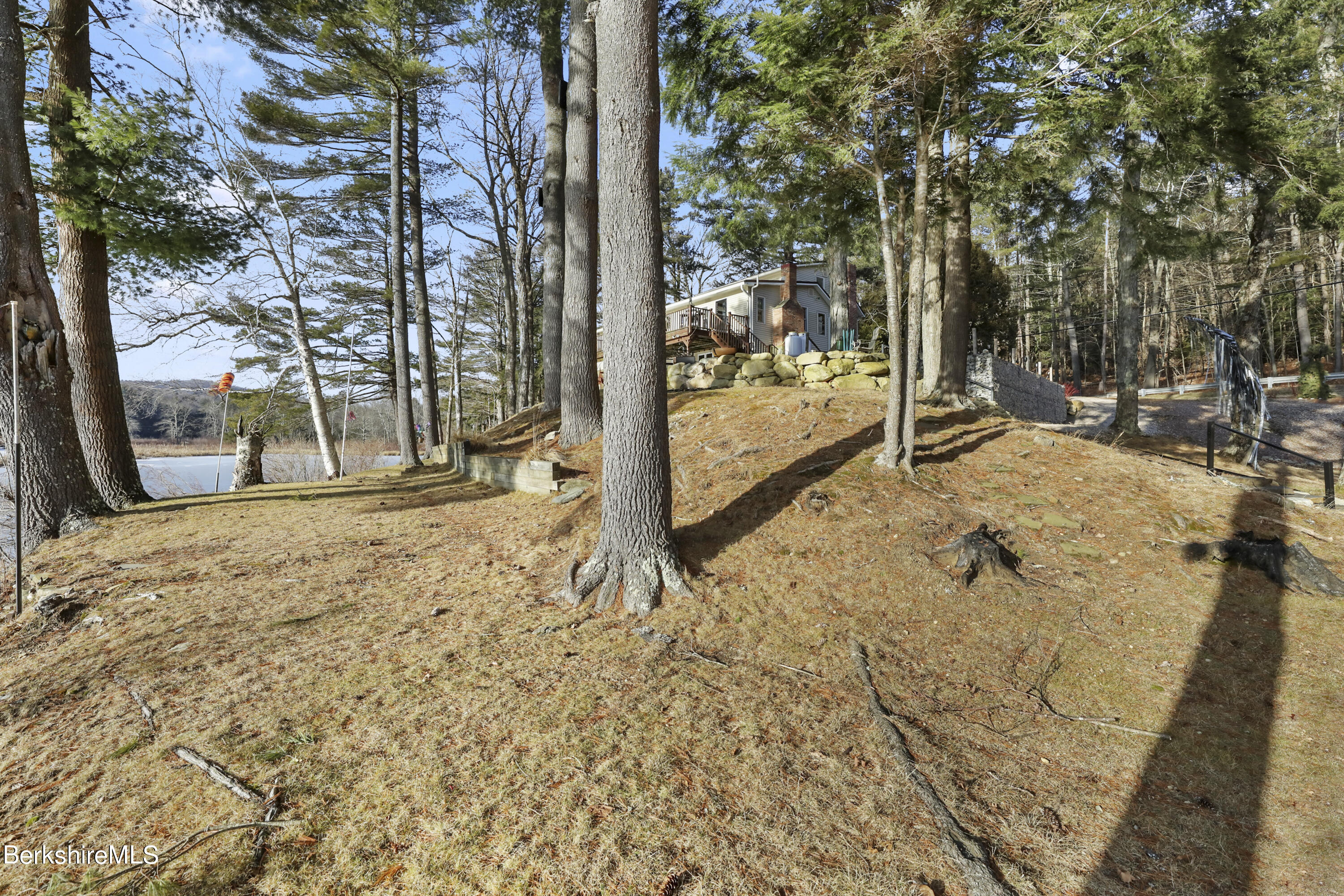 1831 North Main Road Otis, MA 01253 - Photo 21 of 69 a view of a yard covered in snow