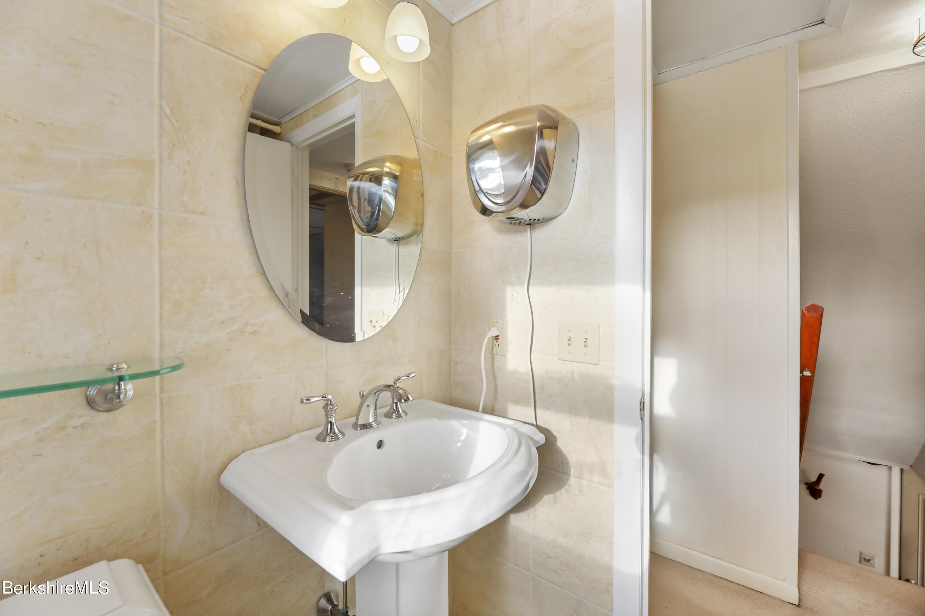 1831 North Main Road Otis, MA 01253 - Photo 55 of 69 a bathroom with a sink and a mirror