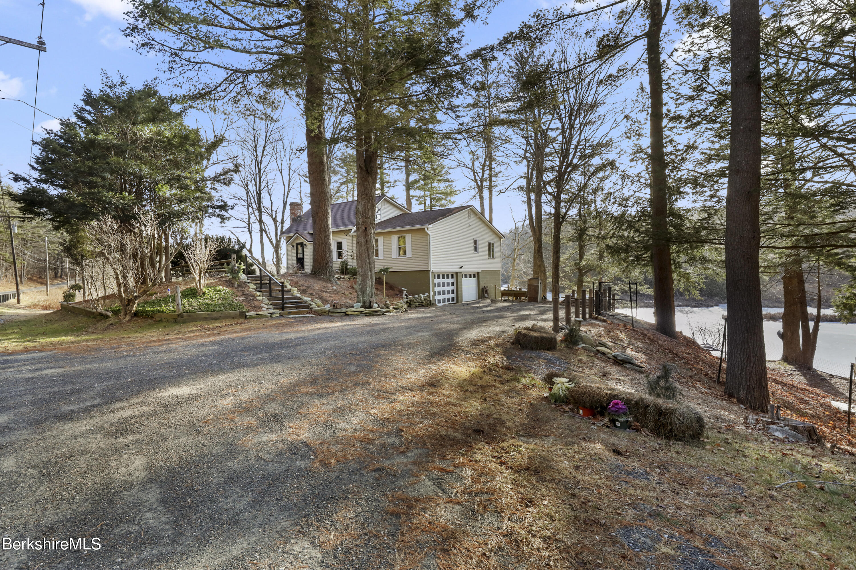 1831 North Main Road Otis, MA 01253 - Photo 7 of 69 a view of road with large trees