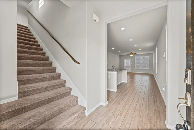 a view of entryway with wooden floor