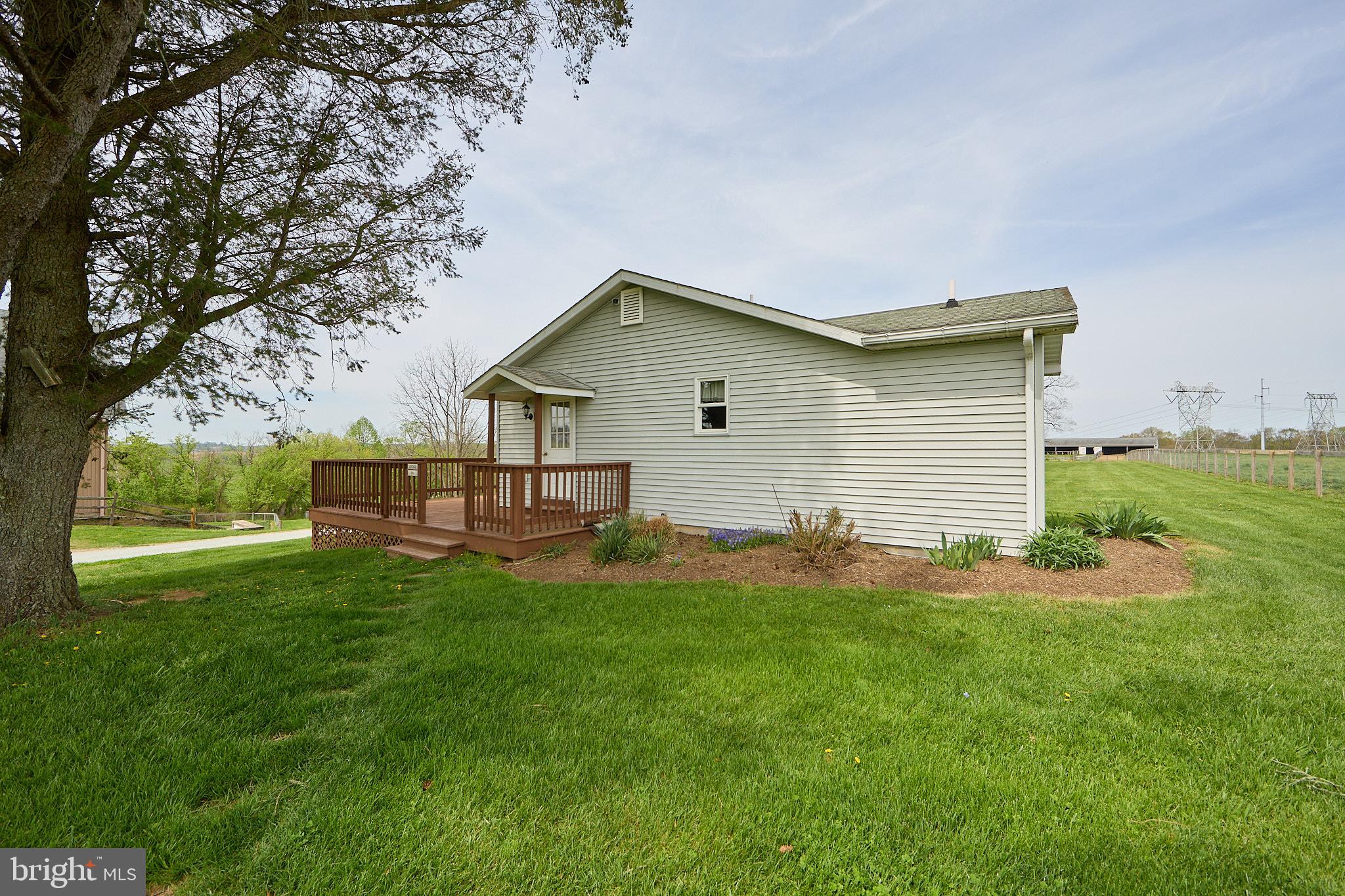 1089 Nesbitt Road Colora, MD 21917 - Photo 53 of 78 a backyard of a house with table and chairs