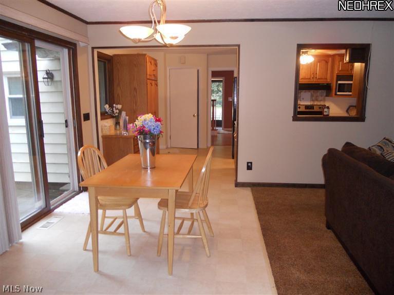 1945 Temblethurst Road South Euclid, OH 44121 - Photo 5 of 15 Updated Kitchen with New Stainless Steel Appliances in 2012, Loads of Cabinets, Pantry, Dinette Area with Sliding Glass Doors to Patio