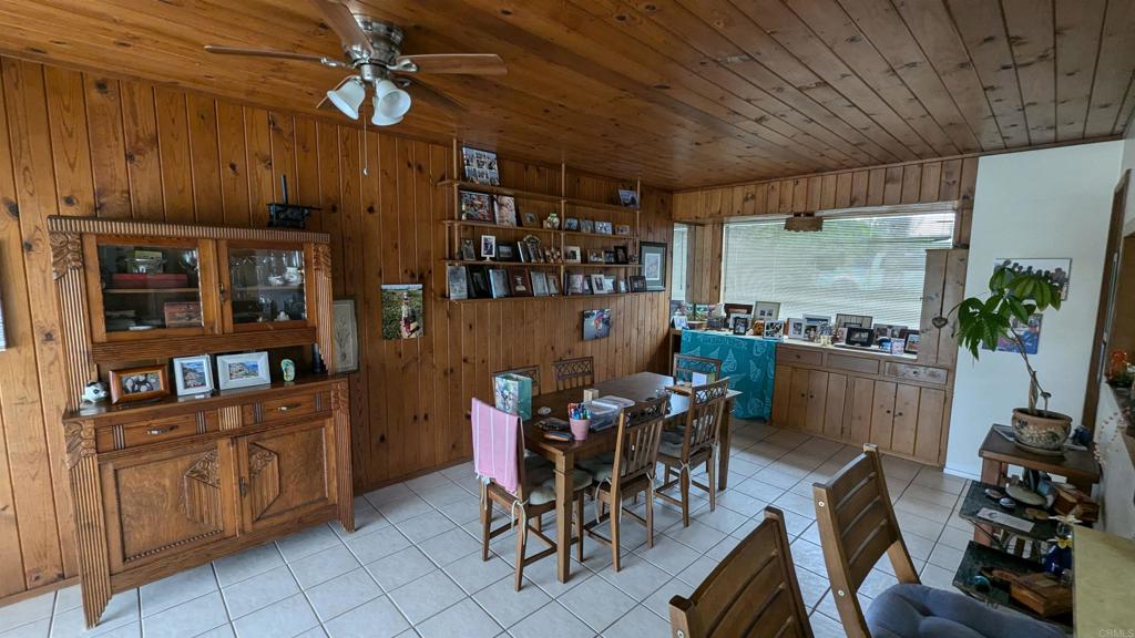 5158 Los Robles Drive Carlsbad, CA 92008 - Photo 12 of 31 a view of a dining room with furniture
