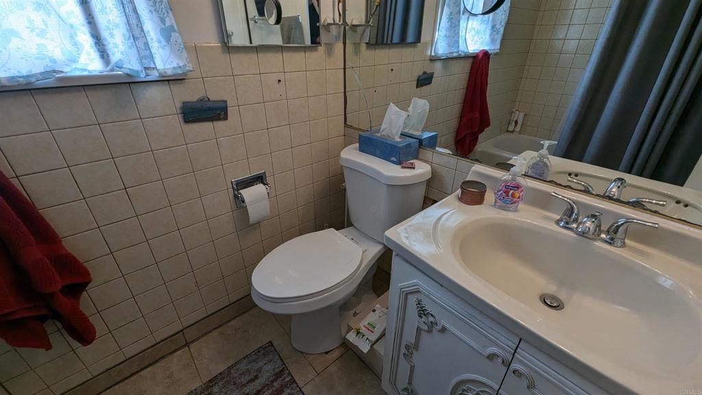 5158 Los Robles Drive Carlsbad, CA 92008 - Photo 16 of 31 a bathroom with a sink and a toilet