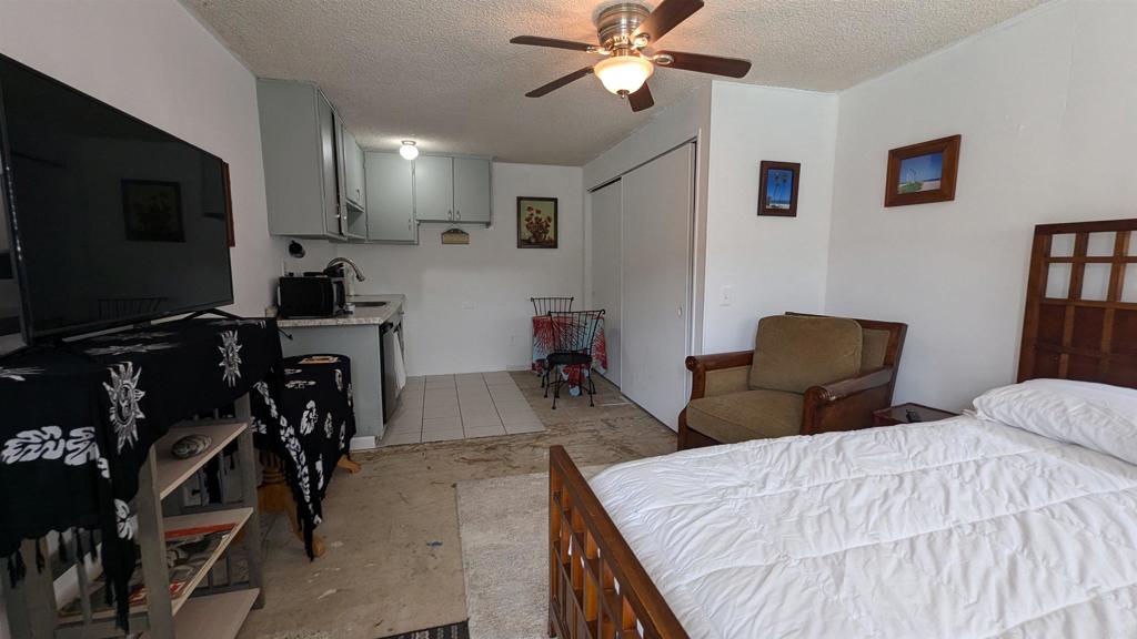 5158 Los Robles Drive Carlsbad, CA 92008 - Photo 22 of 31 a bedroom with a bed and a flat screen tv