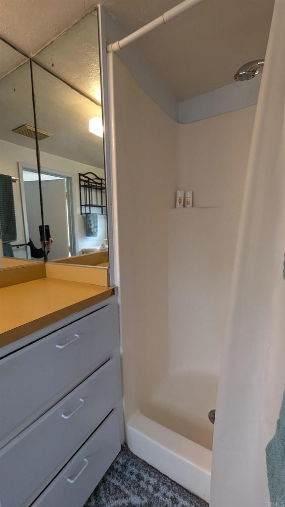 5158 Los Robles Drive Carlsbad, CA 92008 - Photo 27 of 31 a bathroom with a shower