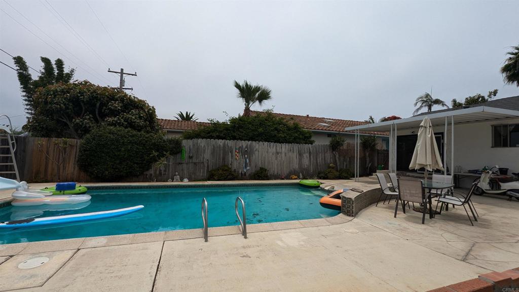 5158 Los Robles Drive Carlsbad, CA 92008 - Photo 30 of 31 a view of a backyard with sitting area and furniture