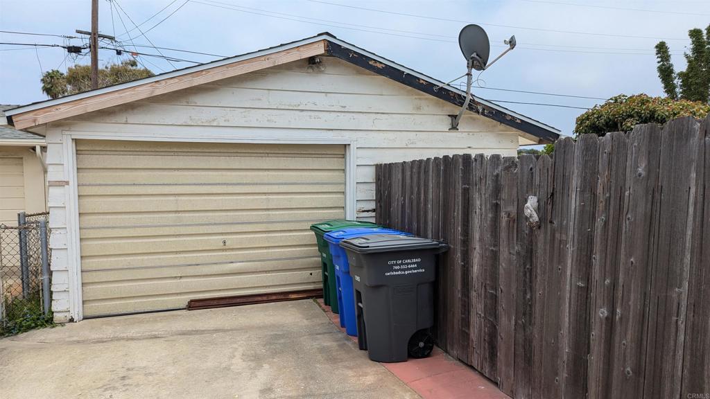 5158 Los Robles Drive Carlsbad, CA 92008 - Photo 31 of 31 a view of a house with a backyard