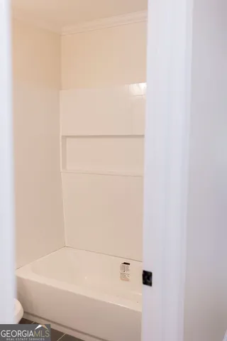 a bathroom with a bathtub