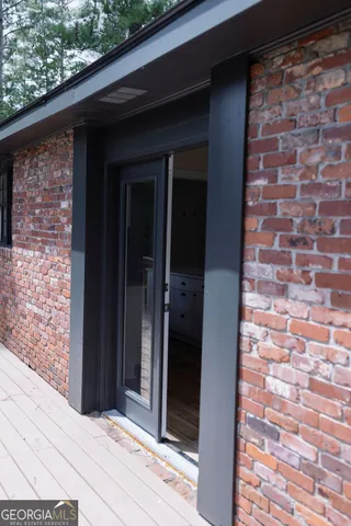 a view of backyard with green space