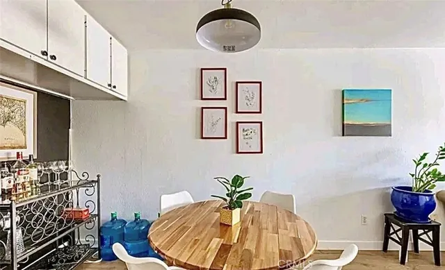 a swimming pool with a potted plant