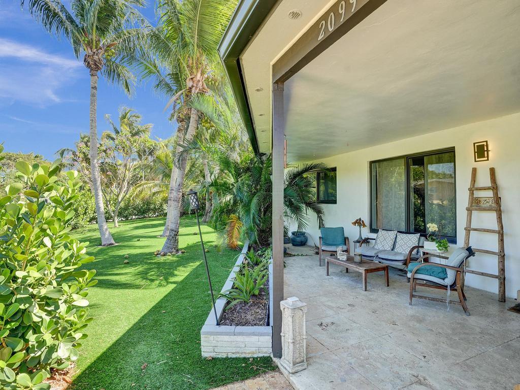 2099 Northeast 4th Court Boca Raton, FL 33431 - Photo 3 of 36 Front Covered Porch