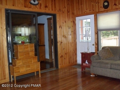 199 Fawn Road Pocono Lake, PA 18347 - Photo 16 of 31 a living room with furniture and a window