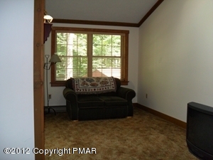 199 Fawn Road Pocono Lake, PA 18347 - Photo 28 of 31 a room with furniture and a window