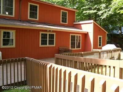 199 Fawn Road Pocono Lake, PA 18347 - Photo 6 of 31 a view of a house with wooden fence