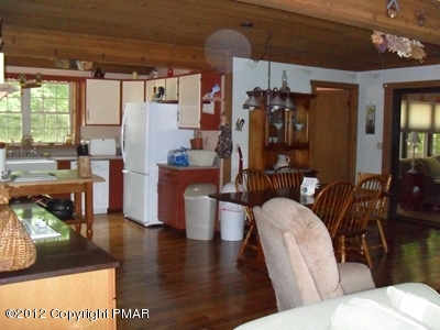 199 Fawn Road Pocono Lake, PA 18347 - Photo 10 of 31 a living room with furniture and a large window