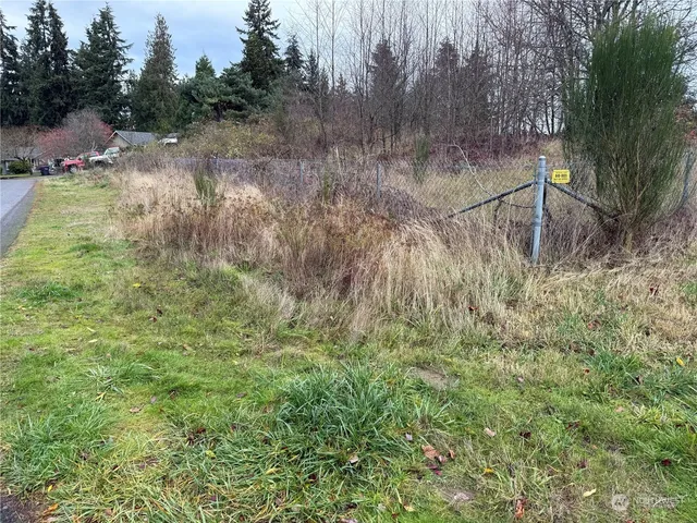 a view of a wooden fence