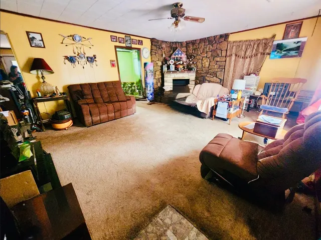 a bed room with furniture and a flat screen tv