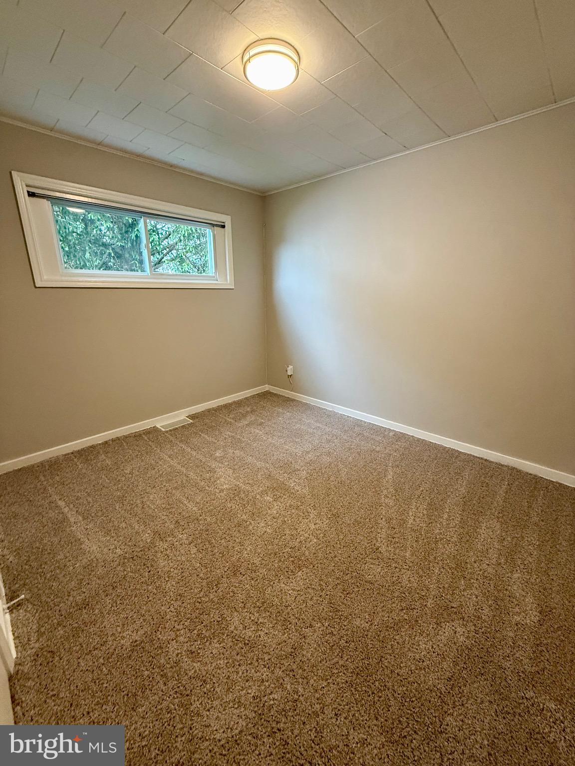 719 East Oldtown Road Cumberland, MD 21502 - Photo 12 of 20 an empty room with a window