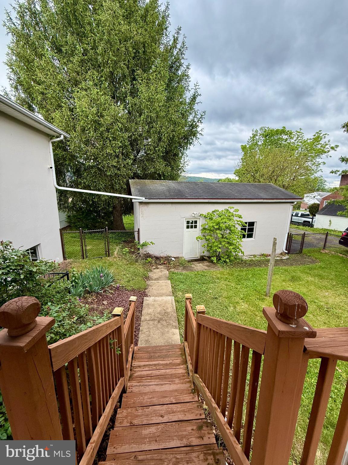 719 East Oldtown Road Cumberland, MD 21502 - Photo 19 of 20 a view of a porch with wooden floor and fence