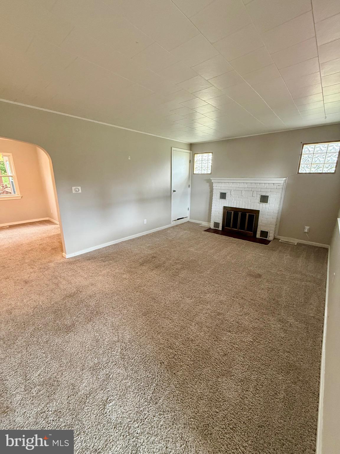 719 East Oldtown Road Cumberland, MD 21502 - Photo 6 of 20 a view of a livingroom with a fireplace