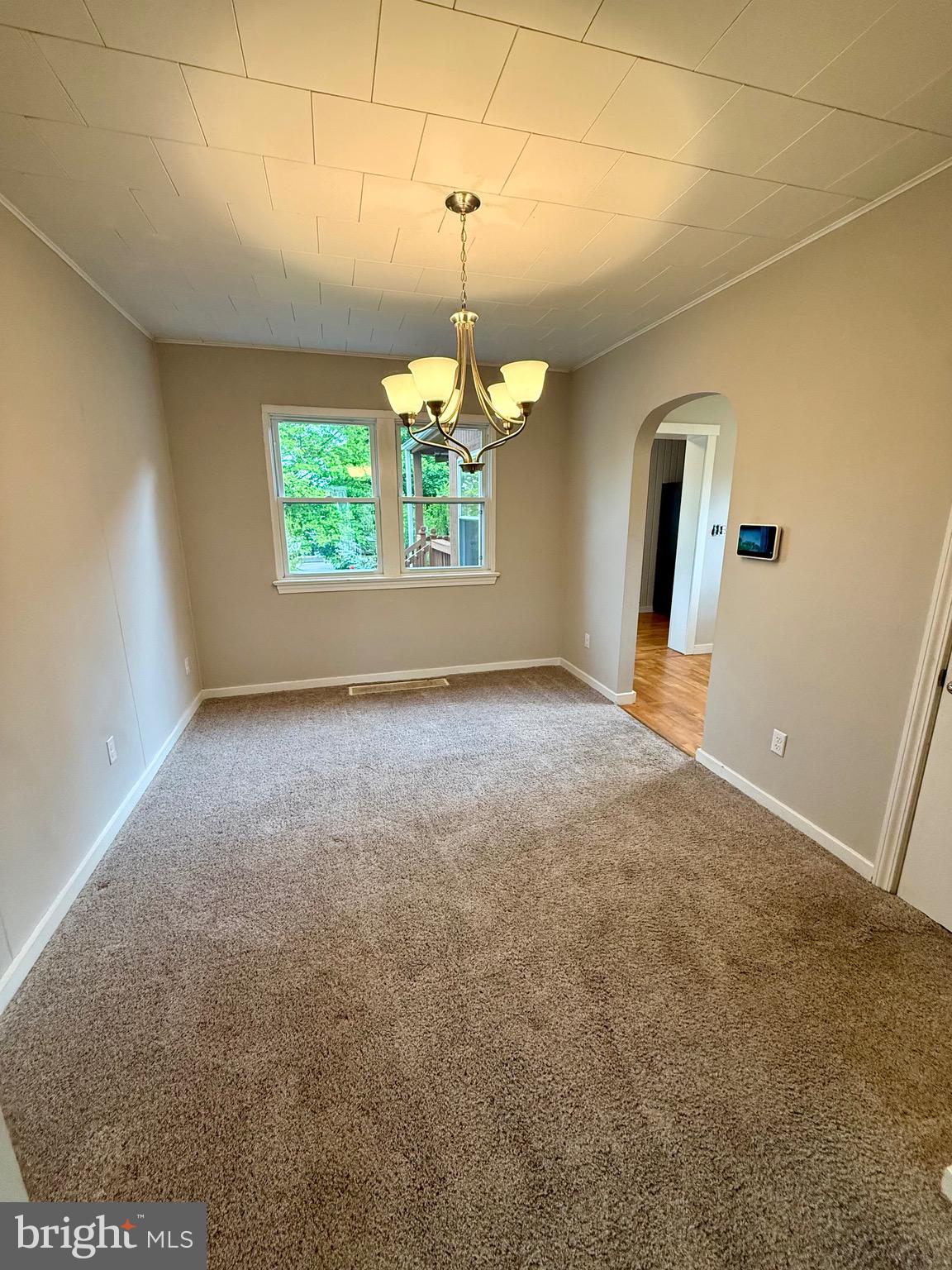719 East Oldtown Road Cumberland, MD 21502 - Photo 8 of 20 a view of a room with windows and chandelier